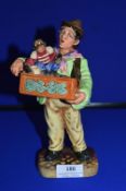 Royal Doulton Figurine – The Organ Grinder