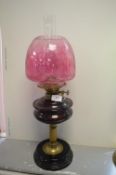 Victorian Oil Lamp on Black Ceramic Base with Brass Columns, Purple Glass Reservoir and Shade