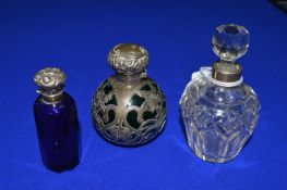 Three Glass Scent Bottles with Hallmarked Silver Mounts, Lids, and Ferrules