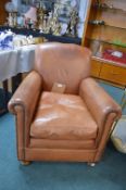 Brown Leather Upholstered Armchair