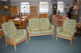 Ercol Wood Framed Three Piece Suite with Green Leather Upholstery