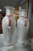 Two Large Vases and a Pair of Classical Figurines