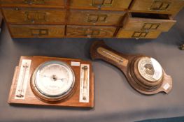 Two Oak Mounted Barometers