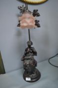 Bronze Effect Decorative Table Lamp with a Lady Re