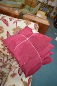 Four Burgundy Cushions