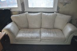 *Cream Upholstered Three Seat Sofa (distressed)
