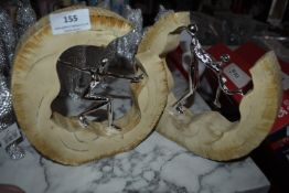 *Two Chrome Effect Figurines in Wood Surrounds 21x20x4cm