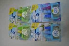 Four Febreze Air Freshener Refills