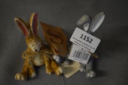 Two Decorative Hares