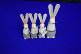 One Large and Three Small Decorative Hares