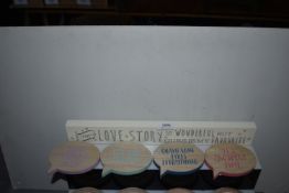 “Every Love Story is Wonderful” Sign, and Four Novelty Coaster