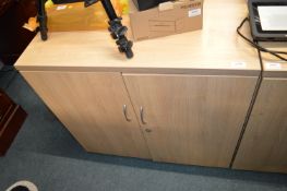 *Simulated Oak Cabinet Enclosed by Double Doors