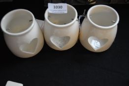 Three Ceramic Tealight Holders with Pierced Hearts