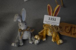 Two Decorative Hares