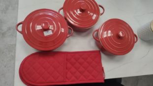 *Three Red Casserole Pots and Oven Gloves