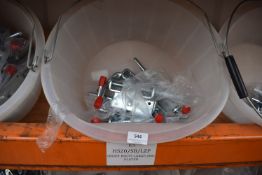 *Feed Bucket Containing Large Spring-Loaded Shoot Bolts
