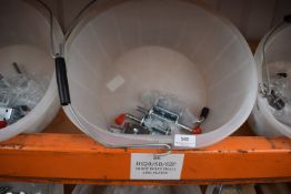 *Feed Bucket Containing Small Shoot Bolts
