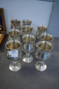 Nine White Metal Wine Goblets