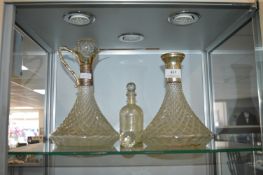 Pressed Glass Claret Jug and a Decanter (one stopp