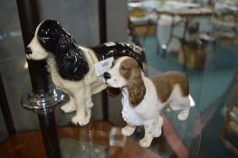 Two Dog Figures