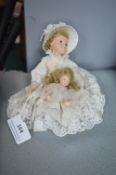 Two Small Porcelain Dolls