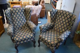 Two Upholstered Wooden Backed Armchairs