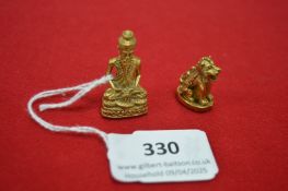 Two Small Gilded Eastern Figures