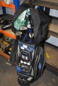 Slazenger Golf Bag Containing Golf Clubs, Golf Balls, and Other Accessories