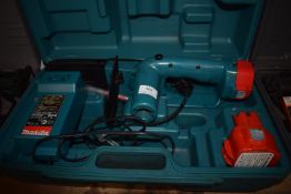 Makita UC120D Cordless Chainsaw with Charger, Spare Battery, and Carry Case