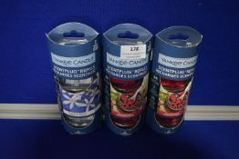 2x 2pk of Yankee Candle Red Raspberry Scent Plug Refills, and 1x 2pk of Midnight Jasmine