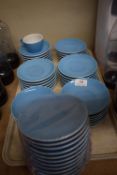 Quantity of Blue Saucers and One Cup