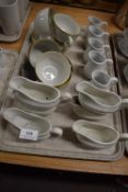 Assortment of Jugs, Cups, and Saucers