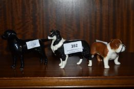 Three Small Beswick Dogs