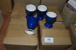 *Four Sets of Four Blue Egg Cups