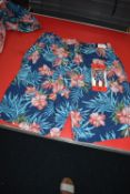 *Kirkland Men’s Blue Floral Swim Shorts Size: M