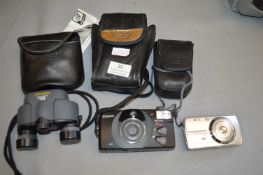 Canon Sure Shot Camera, Olympus U670 Digital Camera, and Pentax 8x Mini Binoculars