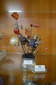 Shoe Containing a Collection of Hat Pins