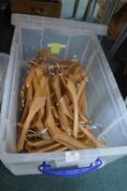 Storage Box Containing Wooden Coat Hangers