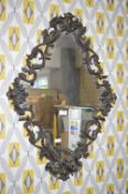Metal Framed Diamond Shaped Mirror
