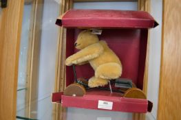Steiff Teddy Bear Riding a Quadricycle