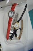 Four Quartz Wristwatches