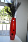 Red Glass Vase with Artificial Feathers
