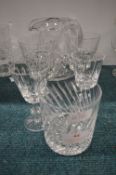 Six Assorted Drinking Glasses and a Jug