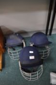Three Slazenger Cricket Headguards