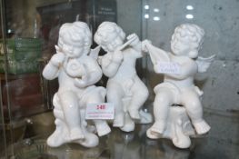 Three Pottery Musical Cherubs