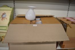 Eighteen White Glass Vases