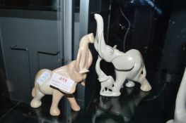Two Carved Soapstone Elephants