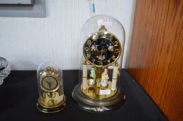 Two Brass Skeleton Clocks with Glass Domes