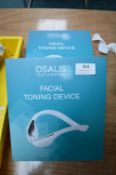 Two Osalis Facial Toning Devices