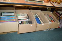 Four Boxes of Assorted Books, Maps, etc.